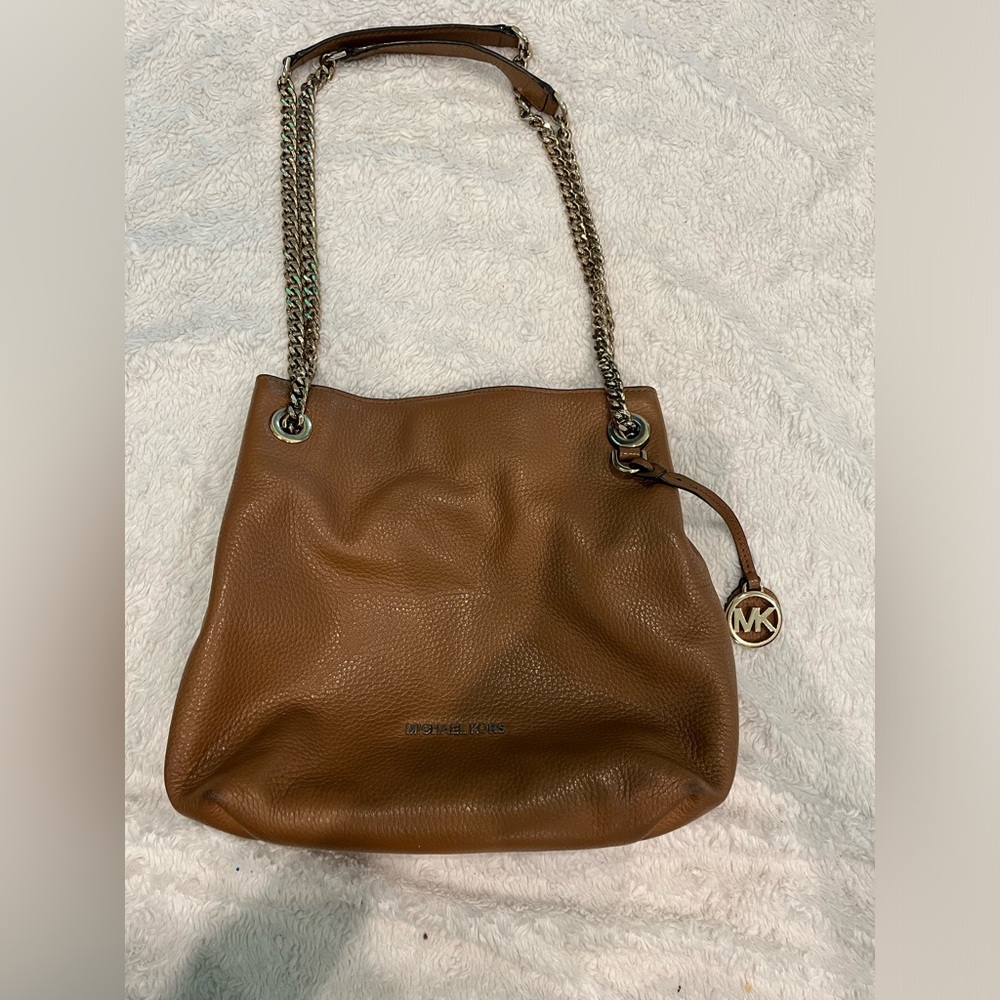 Used MK bag. Needs cleaning from inside.